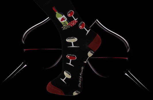 Chaussette avec grappe de raisin,  bouteille de bordeaux et verre de vin blanc et rouge